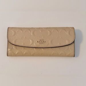 Coach Women’s Signature Debossed Leather Wallet Cream